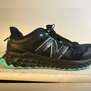 Men’s size 12 Wide New Balance Black Athletic Shoes. Only worn a few times